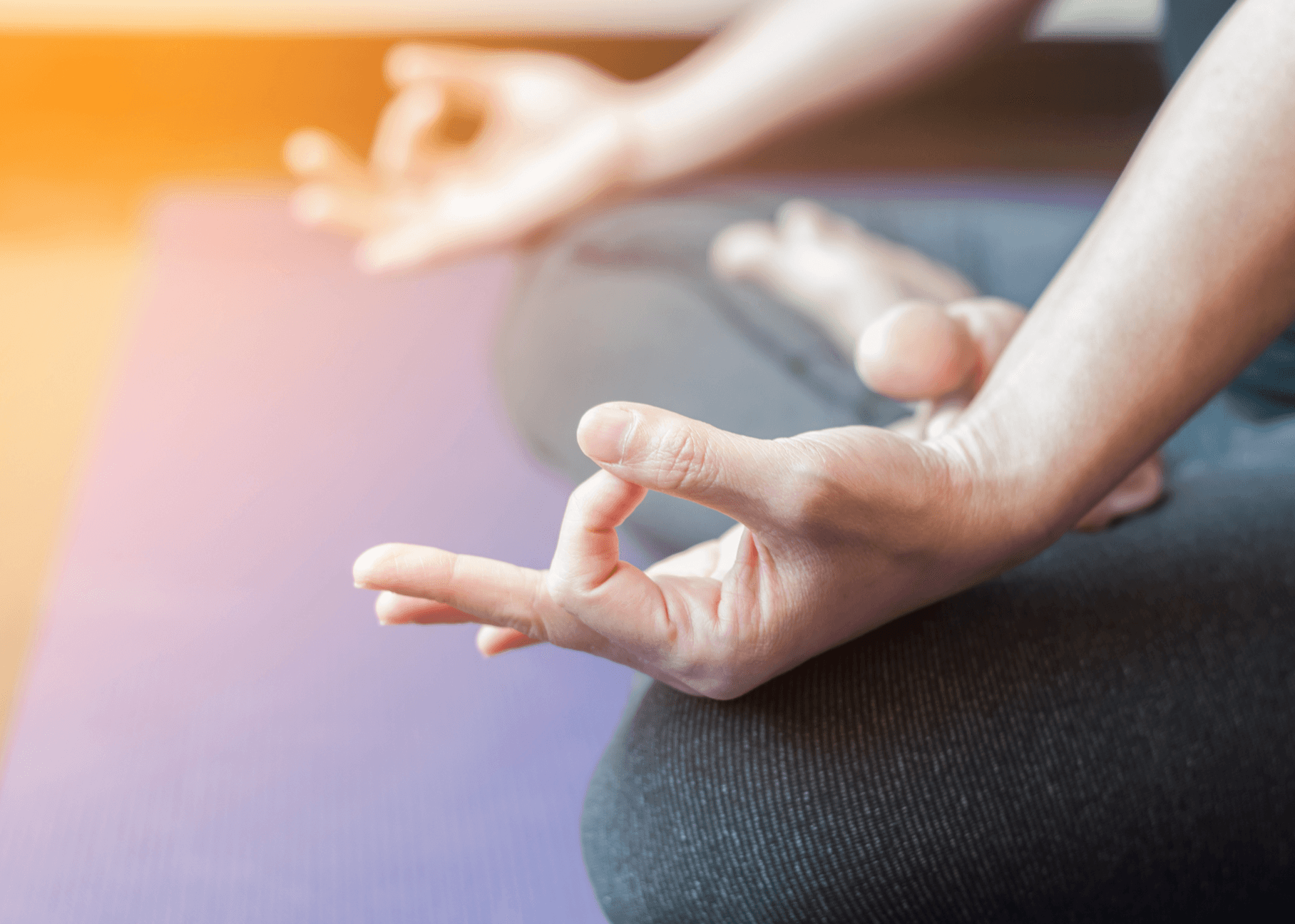Hands resting in a meditation posture